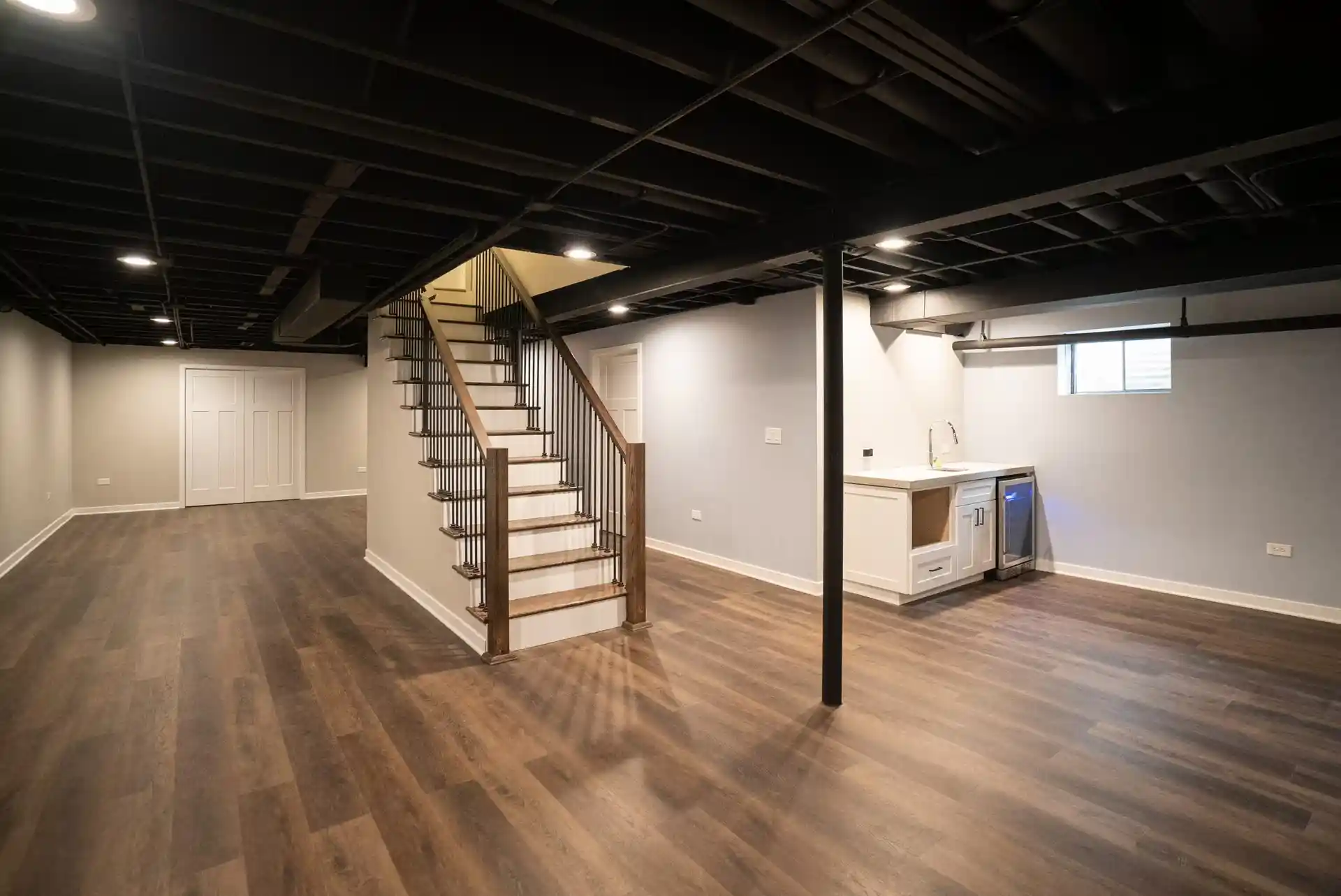 beautiful basement with neat painted walls and wooden floor